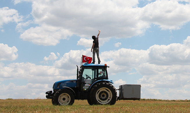 Korean farmer travels world on tractor